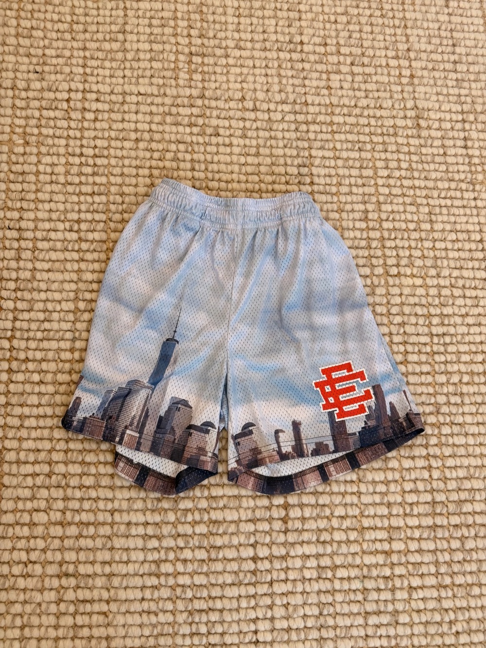 Eric Emanuel Light Blue Mesh Shorts with Red Trim Logo